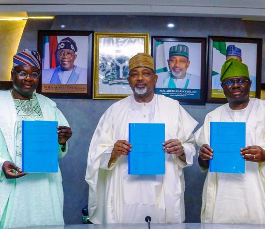 L-R, the Director General, NASRDA, Dr Mathew Adepoju, Minister of Agriculture and Food Security, Sen Abubakar Kyari and Permanent Secretary, Dr Marcus Ogunbiyi during the Signing of Memorandum of Understanding.