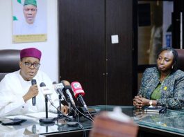 The Honourable Coordinating Minister of Health & Social Welfare Prof. Muhammad Ali Pate CON, addressing Health Reporters during a Ministerial Press Briefing announcing the hosting of the 2025 Joint Annual Report JAR Conference in Abuja. Also, providing insight into the palpable gains recorded by the Federal Government in the health sector between November 2024 till date. Seated on his Left: The Permanent Secretary Federal Ministry of Health & Social Welfare, Daju Kachollom mni.