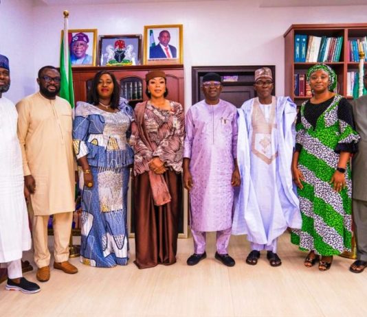 The Honourable Minister of Water Resources and Sanitation, Engr. Prof. Joseph Terlumun Utsev (4th Right), the Senior Special Assistant to the President on Public Health/Nutrition Focal Person, Mrs. Uju Rochas Anwukah (4th Left), and her team during the courtesy visit