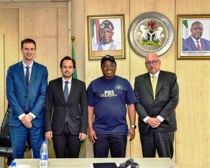during the IMF meeting The Permanent Secretary, MPR. Dr. Emeka Vitalis Obi mni (2nd right) in a group photograph with the delegation of IMF - FAD Technical Assistance mission on climate policy during the meeting.