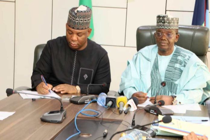 PHOTOSPEAK: The Honourable Minister of Steel Development, Prince Shuaibu Abubakar Audu and the Honourable Minister of State for Defence, his Excellency, Dr. Bella Muhammad Matawalle during the signing of the MoU for the production of Military hardware in Ajaokuta Steel Plant in conjunction with Proforce. The event was held at the Ministry of Defence Headquarters in Abuja today 10th November 2025.