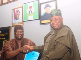 From Left: The outgoing Permanent Secretary of the Federal Ministry of Aviation and Aerospace Development, Dr. Ibrahim Abubakar Kana mni and the incoming Permanent Secretary of the Federal Ministry of Aviation and Aerospace Development, Dr. Yakubu Adam Kofamata during the signing of the hand-over note at the Ministry.