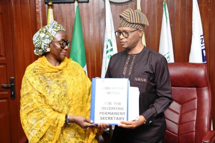 L-R: Dr. Maryam Keshinro, the new Permanent Secretary, Federal Ministry of Youth Development and the outgone Permanent Secretary, Mr Olubunmi Olusanya during the formal handing over in Abuja.