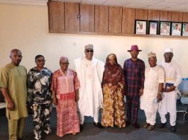 The Executive Director, NIWRMC, Dr. Abdulmumini Aminu Zaria (M) with management staff during the occasion of the Executive Director's first 100 days in office in Abuja.