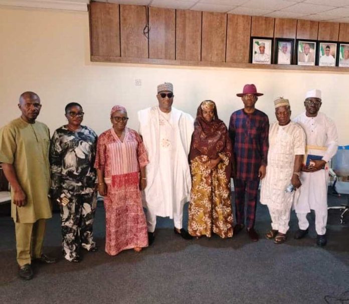 Executive Director's first 100 days in office The Executive Director, NIWRMC, Dr. Abdulmumini Aminu Zaria (M) with management staff during the occasion of the Executive Director's first 100 days in office in Abuja.