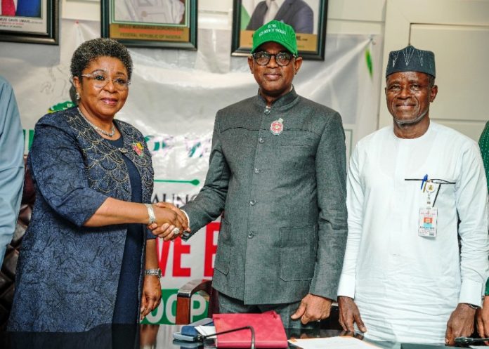 Group Photography of the Honourable Minister of Works, Engr/Sen. Nweze David Umahi ably represented by the Honourable Minister of Works For State, Bello M. Goronyo Esq (Middle), The Head of Civil Service Mrs Didi Esther Walson-Jack, OON, mni, (1st Left) and the Permanent Secreatry, Mr Adeladan Rafiu Olarinre (3rd Right) after declaring open and full implementation of Enterprise Content Management (ECM) System Go-Live at the Ministry Headquarters of Works today 23-12-2025