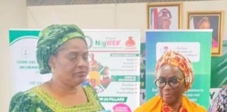R-L : The Out Permanent Secretary, Dr. Maryam Ismaila Keshinro, formally handing over to the incoming Permanent Secretary, Mrs. Esuabana Nko Asanye, during the event held in FMWASD Headquarters, Abuja