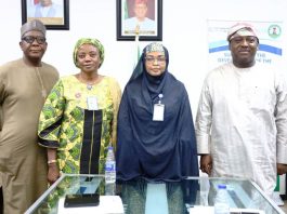 The Permanent Secretary, Federal Ministry of Marine and Blue Economy, Fatima Mahmood (3rd l) flanked by Director, Maritime Services, Oyinloye Meshack (1st l), Director, Planning, Research and Statistics, Kalthum Ibrahim (2nd l) and Director, Maritime Safety and Security, Babatunde Bombata (1st r) after briefing the Permanent Secretary.