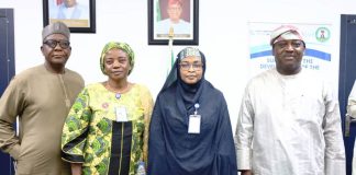 The Permanent Secretary, Federal Ministry of Marine and Blue Economy, Fatima Mahmood (3rd l) flanked by Director, Maritime Services, Oyinloye Meshack (1st l), Director, Planning, Research and Statistics, Kalthum Ibrahim (2nd l) and Director, Maritime Safety and Security, Babatunde Bombata (1st r) after briefing the Permanent Secretary.