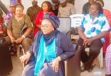 The Honourable Minister of Women Affairs and Social Development, Hajiya Imaan Suleiman-Ibrahim, fsi, in a group photograph with the Beneficiaries of the Renew Hope Food and Economic empowerment Interventions to women, families and households across communities held at FMWASD Headquarters, Abuja.