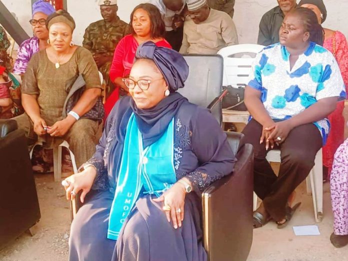 The Honourable Minister of Women Affairs and Social Development, Hajiya Imaan Suleiman-Ibrahim, fsi, in a group photograph with the Beneficiaries of the Renew Hope Food and Economic empowerment Interventions to women, families and households across communities held at FMWASD Headquarters, Abuja.