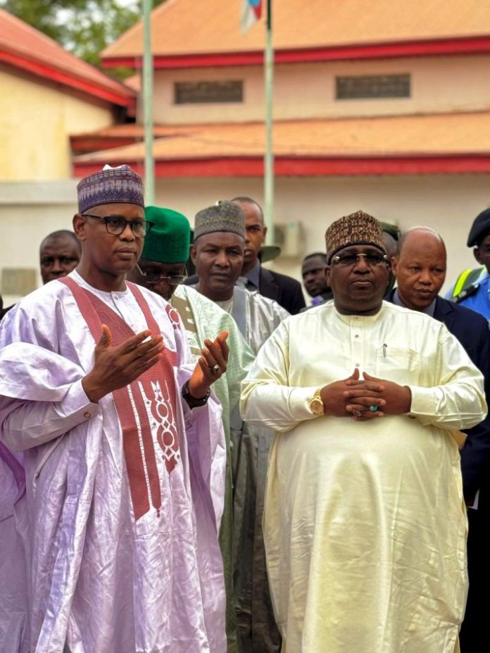 L-R, Bello Muhammad Goronyo, Esq,Honourable Minister of State for Works and Nasir Idris Executive Governor of Kebbi State. At the point of receiving 10 Hilux Vehicles.4th December, 2025.