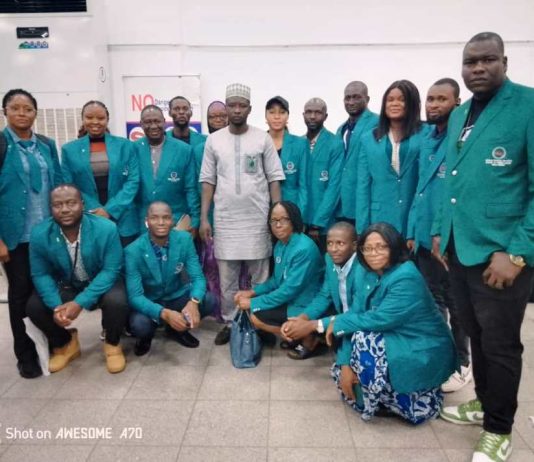 The Volunteers with one of the escorts, a Protocol officer at NTAC, Mr. Hamza, before departing Abuja this morning.