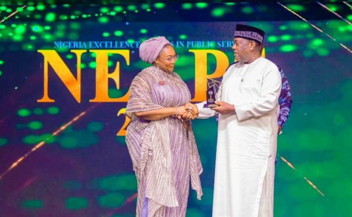 Women Affairs Minister Imaan Honourable Ministér of Women Affairs, Hajiya Imaan Suleiman Ibrahim being conferred Award at the 3rd edition of the Nigeria Excellence Award in Public Service (NEAPS) held on Sunday, December 7, 2025 at the State House Conference Hall, Abuja.