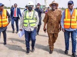 The Minister of Works, Sen. (Engr.) David Umahi flanked by the Permanent Secretary, Mr. Rafiu Adeladan (right), Otunba Segun Showunmi (left) and the Acting Director, Highways (Bridges and Design), Engr. Musa Sa’idu (extreme left) on the completed Keffi Flyover, yesterday.