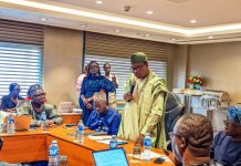 Honourable Minister of State for Health & Social Welfare Dr. Adekunle Salako addressing members of the National Health Research Ethics Committee NHREC, during its 2026 Face- to- Face meeting and Training Workshop in Abuja, and On his immediate right: Dr. Kamil Shoretire Director/Head, Health Planning Research Statistics Department FMoHSW, also On his immediate left: Professor Richard Adegbola Chairman NHREC.