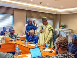 Honourable Minister of State for Health & Social Welfare Dr. Adekunle Salako addressing members of the National Health Research Ethics Committee NHREC, during its 2026 Face- to- Face meeting and Training Workshop in Abuja, and On his immediate right: Dr. Kamil Shoretire Director/Head, Health Planning Research Statistics Department FMoHSW, also On his immediate left: Professor Richard Adegbola Chairman NHREC.