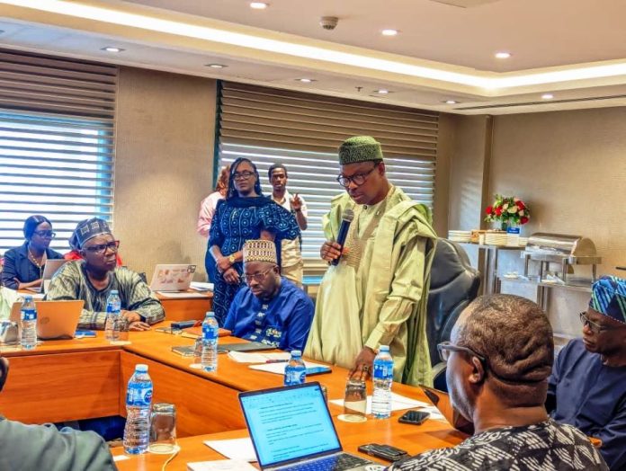 Ethical Health Research Honourable Minister of State for Health & Social Welfare Dr. Adekunle Salako addressing members of the National Health Research Ethics Committee NHREC, during its 2026 Face- to- Face meeting and Training Workshop in Abuja, and On his immediate right: Dr. Kamil Shoretire Director/Head, Health Planning Research Statistics Department FMoHSW, also On his immediate left: Professor Richard Adegbola Chairman NHREC.