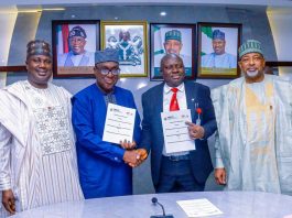 L- R, the Minister of State for Agriculture and Food Security, Sen Dr Aliyu Sabi Abdullahi, Director General, IITA, Dr. Simeon Ehui, Permanent Secretary , Dr Marcus Olaniyi Ogunbiyi and Minister of Agriculture and Food Security, Sen Abubakar Kyari during the Signing of the Memorandum of Understanding on Fertilizer and Soil Health.