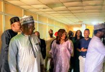 The Permanent Secretary MPR. Mrs. Patience N. Oyekunle (center) undertaking a guided tour of the facilities of NNRA in Abuja.