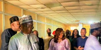 The Permanent Secretary MPR. Mrs. Patience N. Oyekunle (center) undertaking a guided tour of the facilities of NNRA in Abuja.