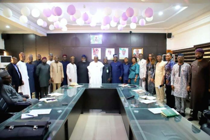 Middle: Dr. Iziaq Adekunle Salako On his Immediate Left: Alhaji Mahmuda Mamman, Permanent Secretary Federal Ministry of Power, representing the Honourable Minister of Power, and Surrounded by members of the newly Inaugurated Inter-Agency Technical Committee IATC