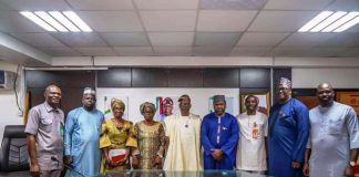 Middle: Dr. Iziaq Adekunle Salako Honourable Minister of State for Health & Social Welfare, On his Right: Dr. Abisola Adegoke mni, Director/Head Hospital Services Department FMoHSW; Chairman Work Hour Regulation & Locum Engagement Policy, On her Left: Dame Francisca Okafor Director Regulatory & Professional Schools Division ( Hospital Services Department) FMoHSW, and Surrounded by other members.