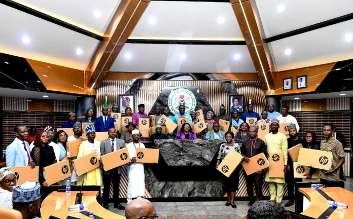 FG Advances Digital Transformation as HCSF Presents NITDA-Donated Laptops to 35 Civil Servants at DL4ALL Awards