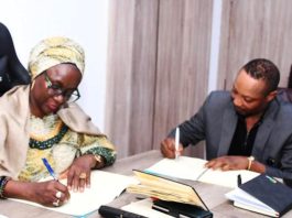 L-R: The Permanent Secretary, Federal Ministry of Youth Development (FMYD), Dr. Maryam Keshinro, and the Managing Director of Stratcomm Consulting, Dr. Kayode Olanorin, during the signing of the Memorandum of Understanding (MoU).