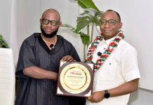 Right: Director-General, Bureau of Public Procurement (BPP), Dr. Adebowale A. Adedokun, FCIPS, FCILT, FSM presented with the Award of 2026 African Leadership and Good Governance by the Aljazirah Bureau Chief, Mr. Etuk Bassey William in Abuja