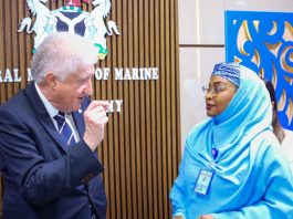 Permanent Secretary, Federal Ministry of Marine & Blue Economy, Fatima Sugra Tabi'a Mahmood (r) listens as Executive Director, Atlantic International Research Centre, Prof. Miguel Miranda outlines the organization's efforts to support Nigeria's maritime sector.