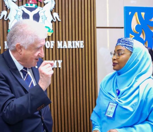 Permanent Secretary, Federal Ministry of Marine & Blue Economy, Fatima Sugra Tabi'a Mahmood (r) listens as Executive Director, Atlantic International Research Centre, Prof. Miguel Miranda outlines the organization's efforts to support Nigeria's maritime sector.