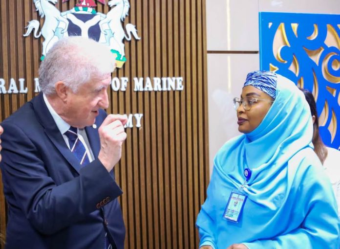 Permanent Secretary, Federal Ministry of Marine & Blue Economy, Fatima Sugra Tabi'a Mahmood (r) listens as Executive Director, Atlantic International Research Centre, Prof. Miguel Miranda outlines the organization's efforts to support Nigeria's maritime sector.