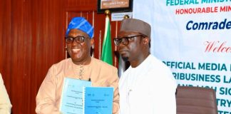 R–L: The Honourable Minister, Federal Ministry of Youth Development, Comrade Ayodele Olawande, and the Director-General, International Institute of Tropical Agriculture (IITA), Dr. Simeon Ehui, displaying the Memorandum of Understanding (MoU) document following its signing during the launch of the Youth in Agribusiness Land Trust Fund (YALTF), today at the Minister’s Office, Abuja.