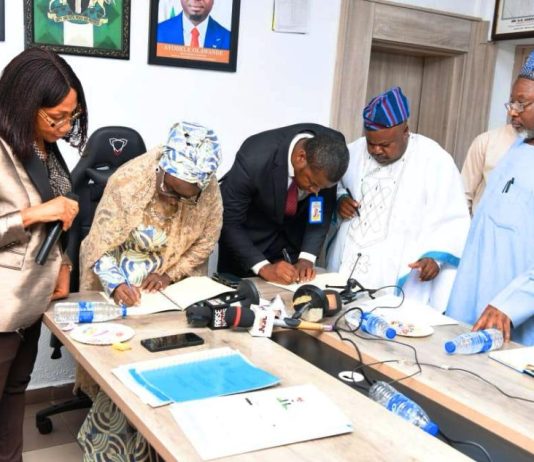 2nd left is the Permanent Secretary, Federal Ministry of Youth Development Dr.(Mrs) Maryam Keshinro while signing the MoUs with both Organisations in Abuja