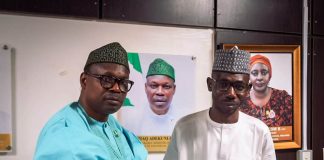 Honorable Minister of State for Health and Social Welfare Dr Iziaq Adekunle Salako, presenting letter of appointment to Dr Idris Garba, the newly appointed Registrar, Radiographers Registration Board of Nigeria