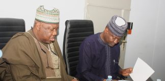Signing of Handing Over Document by the Outgoing Permanent Secretary and the Incoming Permanent Secretary during the Event.