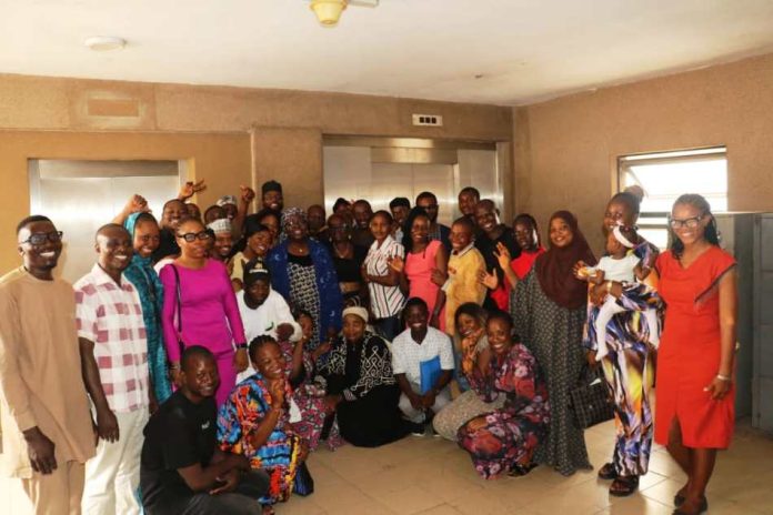 The Executive Secretary FGSHLB, Hajiya Salamatu Ladi Ahmed, flanked by the inductees.