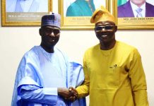 Steel–Industry Leadership Shake-Up: Tinubu Approves Strategic Perm Sec Swap To Drive Nigeria’s Industrial Growth The outgoing Perm. Sec. of the Federal Ministry of Industry, Trade & Investment (FMITI), Amb. Nura Abba Rimi (left) and the incoming Perm. Sec. , Dr. Chris Osa Isokpunwu (right), in hand shake during the handing over Ceremony held on Friday 13/3/26.