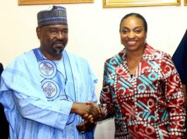 The Hon. Min. FMITI, Dr. Jumoke Oduwole MFR. , in a handshake with the Chairman of the just Inaugurated Board of Nigeria Commodity Exchange (NCX) , Alhaji Dalhatu Abubakar, after the Inauguration in Abuja on Wednesday 8/4/26.