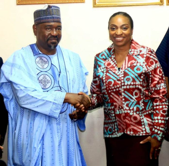 Export Revolution Begin The Hon. Min. FMITI, Dr. Jumoke Oduwole MFR. , in a handshake with the Chairman of the just Inaugurated Board of Nigeria Commodity Exchange (NCX) , Alhaji Dalhatu Abubakar, after the Inauguration in Abuja on Wednesday 8/4/26.