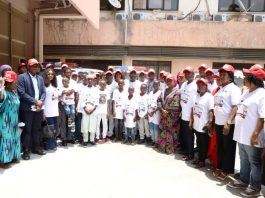 A group photograph of stakeholders and persons living with haemophilia with the representative of the Honourable Coordinating Minister of Health and Social Welfare Dr. Kamil Shoretire and other distinguished guests after the press briefing.