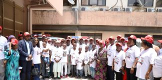 A group photograph of stakeholders and persons living with haemophilia with the representative of the Honourable Coordinating Minister of Health and Social Welfare Dr. Kamil Shoretire and other distinguished guests after the press briefing.
