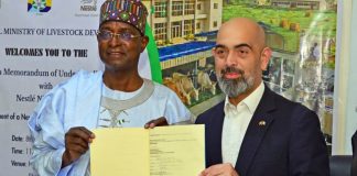 The Honourable Minister Federal Ministry of Livestock Development, Idi Mukhtar Maiha at the centre flanked by the MD /CEO Nestle Nigeria Plc, Mr Wassim Elhussienni, during the Mou signing ceremony today in Abuja.