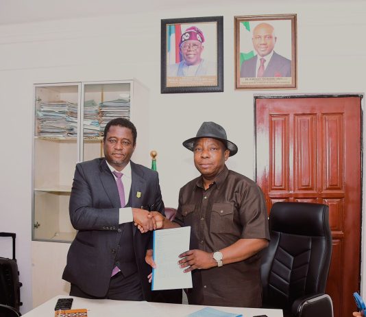 Outgoing Permanent Secretary, FMIST, Mr. Philip Ndiomu Ebiogeh (right) handing over document to the New Permanent Secretary, Federal Ministry of Innovation, Science and Technology (FMIST) Dr. Mukhtar Yawale Muhammad, (left) today in Abuja.