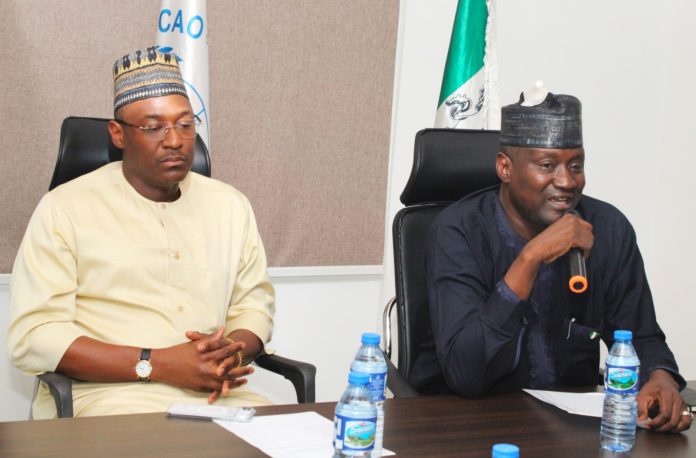 R-L: Permanent Secretary, Federal Ministry of Aviation and Aerospace Development; Mahmud Adam Kambari FNCA FICA, with Director General / Chief Executive Officer, Nigerian Safety Investigative Bureau; Capt. Alex Sabundu Badeh during a Courtesy visit to the Agency.