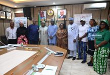 4th L: RMAFC Chairman, Dr. Mohammed Bello Shehu OFR; 5th L: Dr. Olubunmi Tunji-Ojo; 6th L: Permanent Secretary, Ministry of Interior, Dr. Magdalene Ajani in a group photograph with members of the Commission and Directors of the Ministry of Interior.