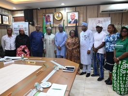 4th L: RMAFC Chairman, Dr. Mohammed Bello Shehu OFR; 5th L: Dr. Olubunmi Tunji-Ojo; 6th L: Permanent Secretary, Ministry of Interior, Dr. Magdalene Ajani in a group photograph with members of the Commission and Directors of the Ministry of Interior.