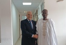 The Honourable Minister, Federal Ministry of Livestock Development Idi Mukhtar Maiha, in a handshake with the CEO of MCI Sante' Animale, Dr. Tadiaoui Omari Khalid, today in his office.