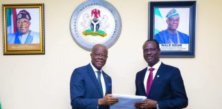 Former Minister of Finance and Coordinating Minister of the Economy Mr. Wale Edun handing over the baton of Office to Mr. Taiwo Oyedele Minister of Finance and Coordinating Minister of the Economy